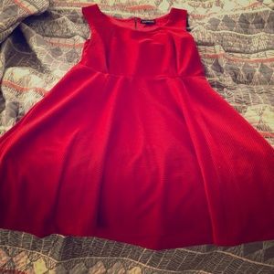 Red sleeveless swing dress